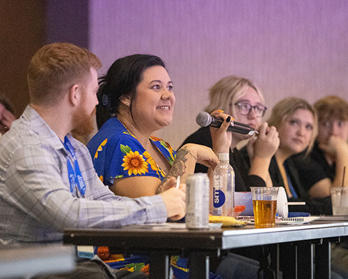 Attendee at Amusement 360 asking a question